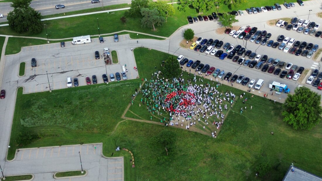PHOTOS: Fans gather at Algerian flag earthwork to celebrate World Cup team